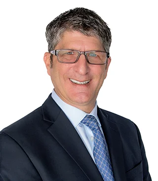 Portrait of Mitch Kay, Realtor.