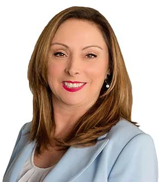 Portrait of Mary Nangle, Realtor.