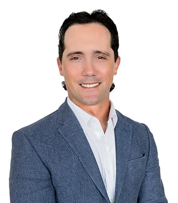 Portrait of Andrew Coffey, Realtor.