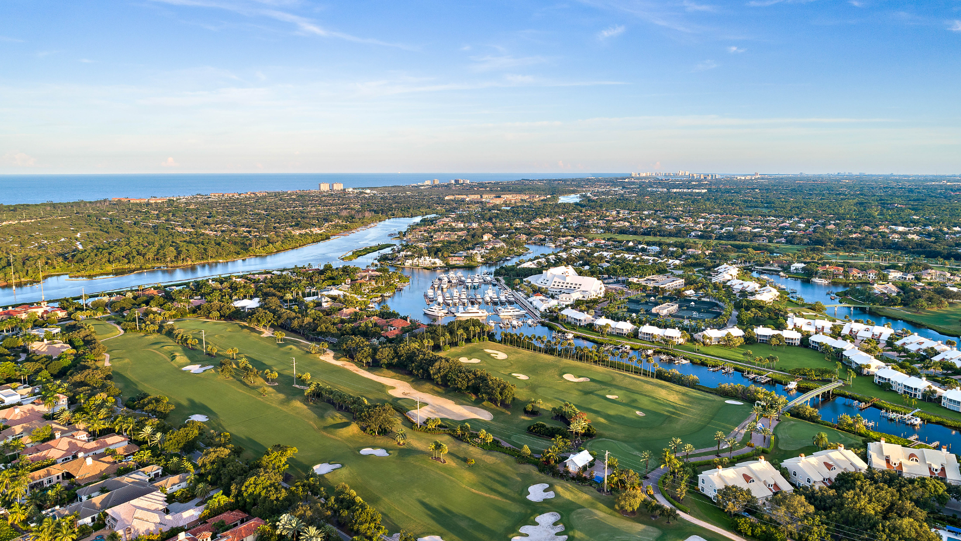 an aerial photo of some of the golf course homes in Jupiter, Florida