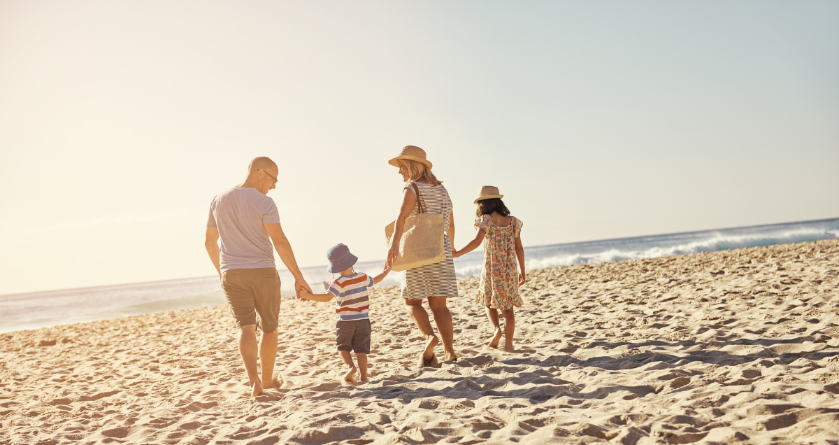 a family spending Mother's Day on the beach in Palm Beach, Florida